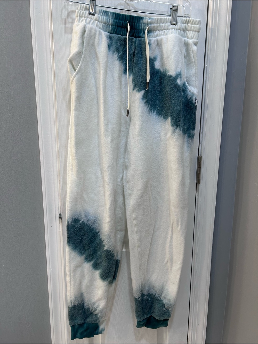 White Joggers with Teal Tie-Dye Accents and Drawstring Waist